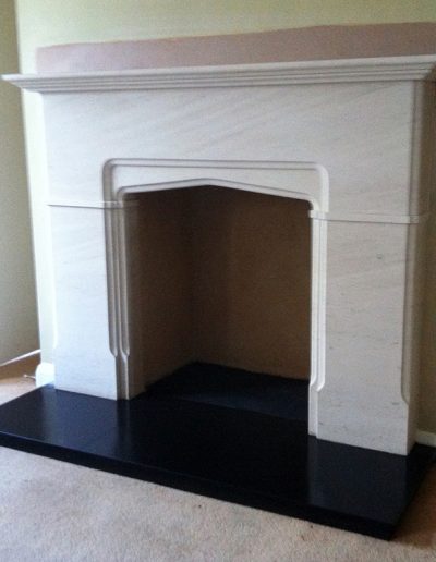 One of our original designs, this limestone surround is fitted with a slate hearth