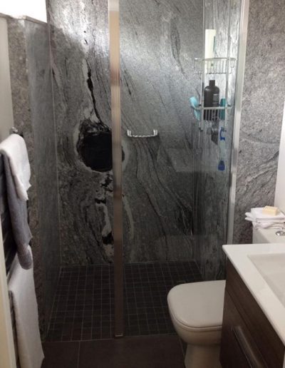 We worked with interior designers, Inspire Design, to source this unique granite to clad this shower cubicle