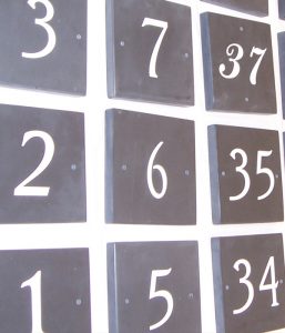 We make house numbers and personalised plaques in limestone, granite and slate